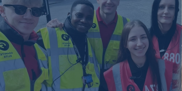 Security personels in a group picture.