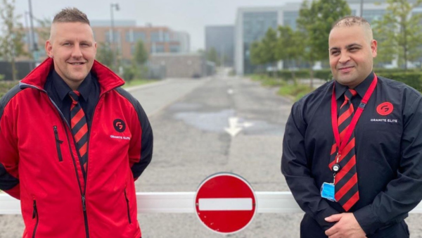 Image of two Granite Elite security staff guarding a property